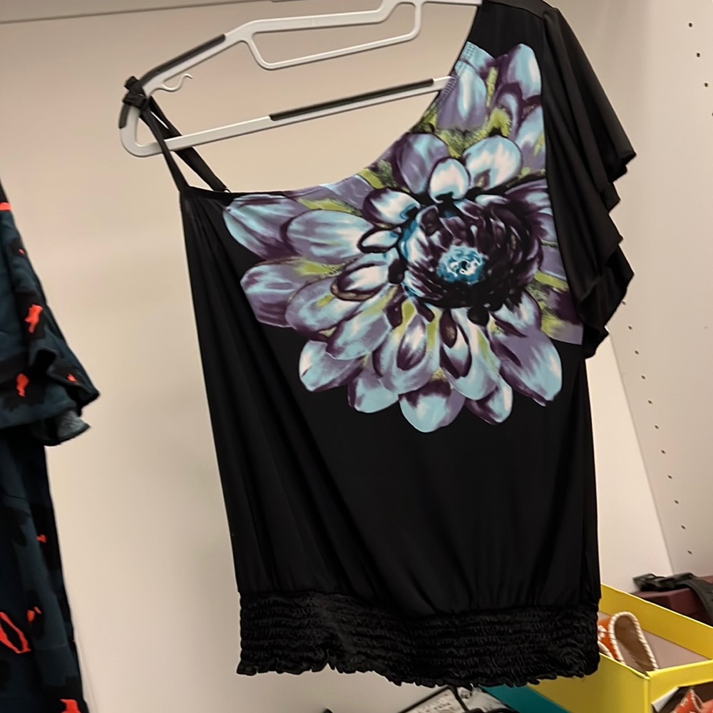 Iz Byer top with open shoulder and adjustable strap.
